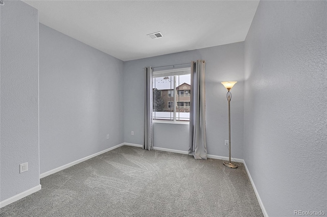 view of carpeted spare room