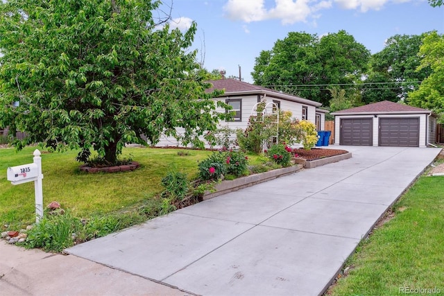 1815 Ingalls St, Lakewood, CO 80214 - view of front of property with a garage, a front lawn, and an outbuilding
