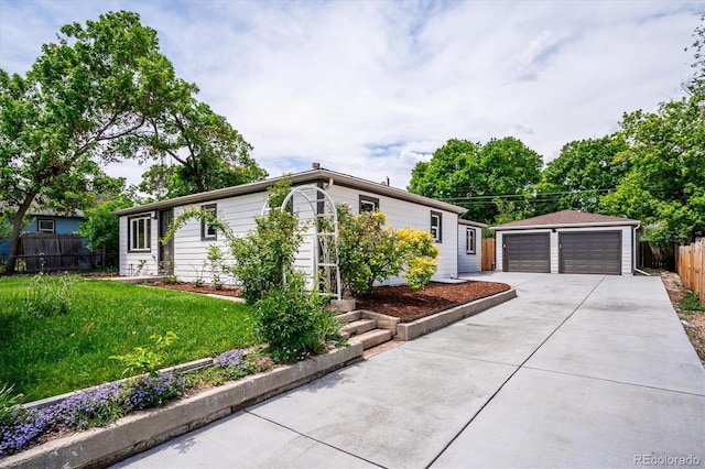 1815 Ingalls St, Lakewood, CO 80214 - ranch-style home featuring a garage and an outbuilding