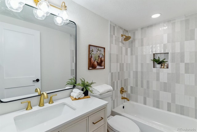 1815 Ingalls St, Lakewood, CO 80214 - bathroom featuring vanity, toilet, and  shower combination