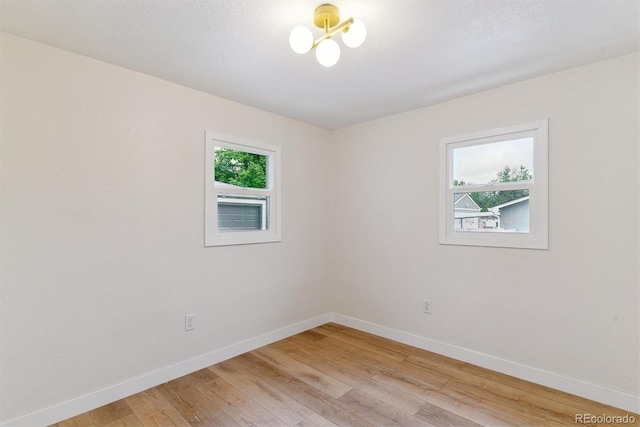 1815 Ingalls St, Lakewood, CO 80214 - unfurnished room featuring light wood-type flooring and baseboards
