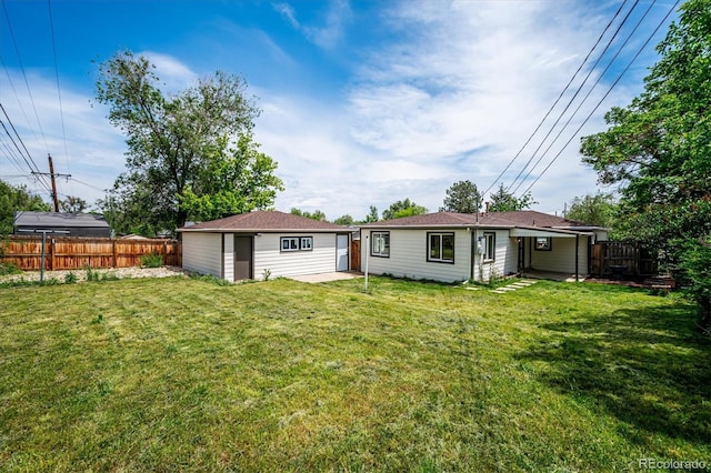 1815 Ingalls St, Lakewood, CO 80214 - rear view of property featuring an outdoor structure