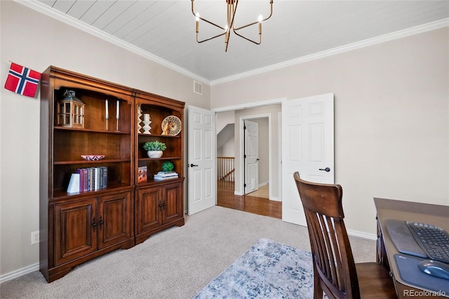 office space with carpet floors, baseboards, a chandelier, and crown molding