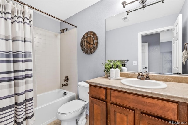 full bathroom with shower / bath combo, visible vents, vanity, and toilet