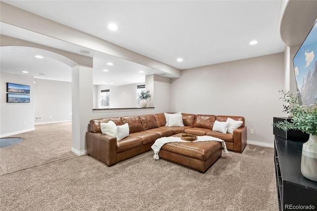 living room with baseboards, carpet, and recessed lighting