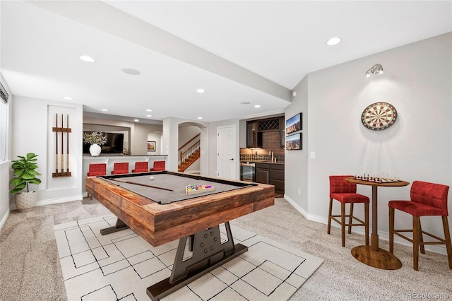 playroom featuring light carpet, pool table, beverage cooler, and indoor wet bar