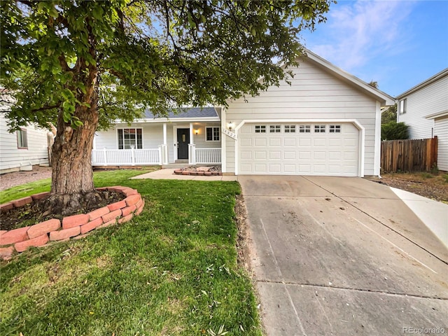 14822 E Adriatic Pl, Aurora, CO 80014 - ranch-style home with an attached garage, concrete driveway, and a porch
