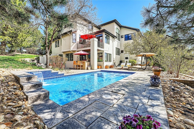6961 Salvia St, Arvada, CO 80007 - outdoor pool featuring a patio area