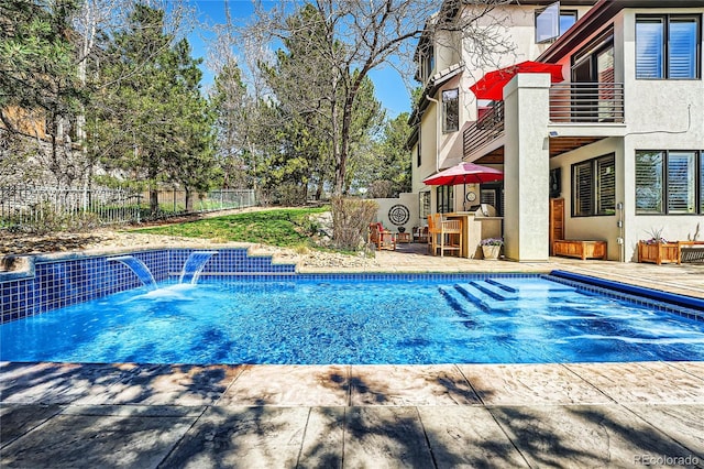 6961 Salvia St, Arvada, CO 80007 - view of swimming pool featuring a fenced backyard and a patio area