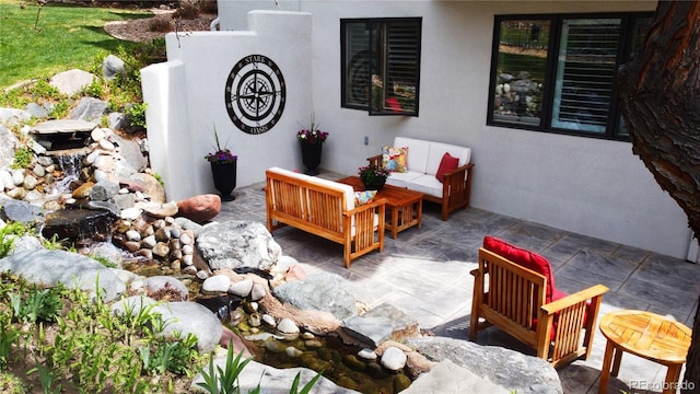 6961 Salvia St, Arvada, CO 80007 - view of patio / terrace with an outdoor living space