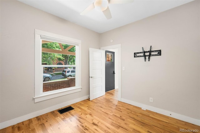 1753 W 36th Ave, Denver, CO 80211 - unfurnished room with wood finished floors and a ceiling fan