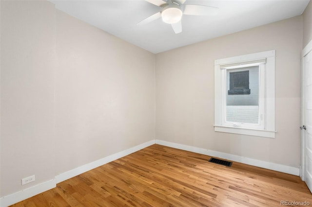 1753 W 36th Ave, Denver, CO 80211 - empty room featuring light wood finished floors and a ceiling fan
