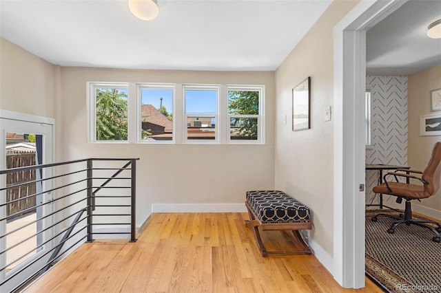 1753 W 36th Ave, Denver, CO 80211 - hall featuring healthy amount of natural light, wood finished floors, and an upstairs landing