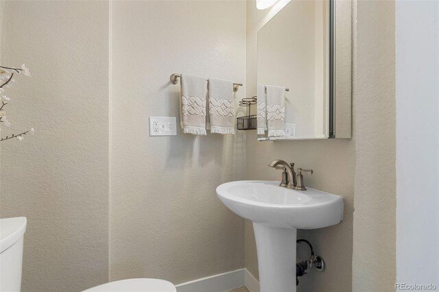 1753 W 36th Ave, Denver, CO 80211 - bathroom with toilet and a sink