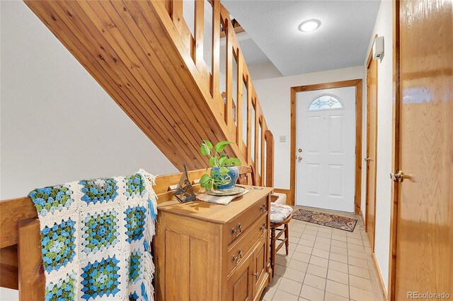 4863 Silver Spruce Ln, Evergreen, CO 80439 - entryway with light tile patterned floors