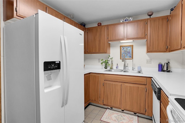 4863 Silver Spruce Ln, Evergreen, CO 80439 - kitchen featuring white appliances, a sink, light countertops, and light tile patterned floors
