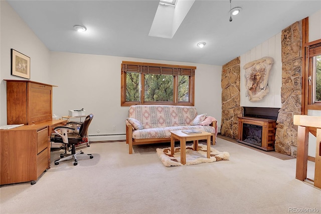 4863 Silver Spruce Ln, Evergreen, CO 80439 - office featuring baseboard heating, carpet floors, lofted ceiling, a fireplace, and a skylight