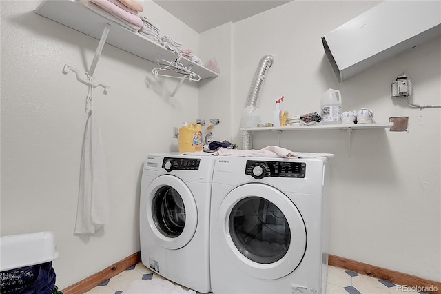 4863 Silver Spruce Ln, Evergreen, CO 80439 - washroom with washing machine and dryer and baseboards