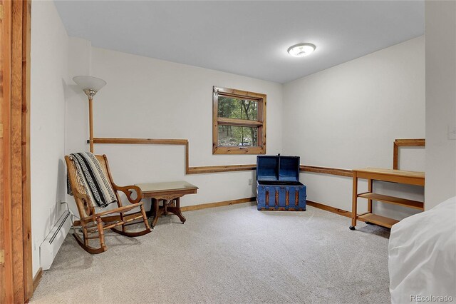 4863 Silver Spruce Ln, Evergreen, CO 80439 - sitting room featuring carpet, a baseboard radiator, and baseboards
