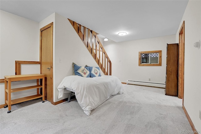 4863 Silver Spruce Ln, Evergreen, CO 80439 - carpeted bedroom with a baseboard radiator and baseboards