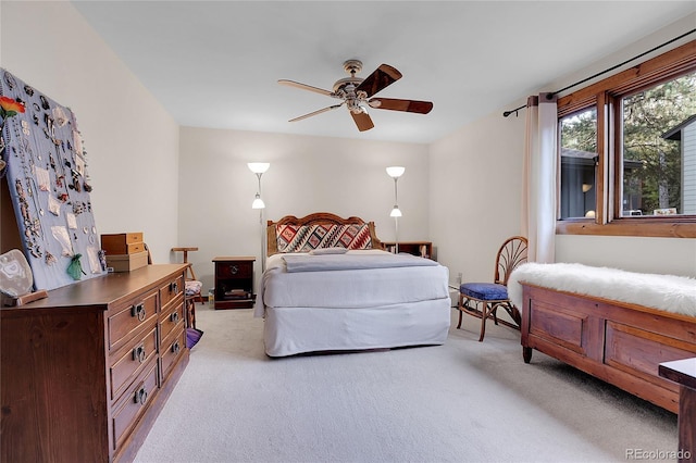 4863 Silver Spruce Ln, Evergreen, CO 80439 - bedroom featuring light carpet and a ceiling fan