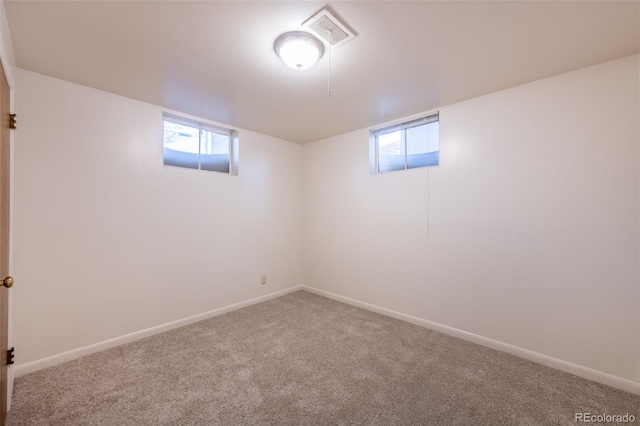 basement with carpet flooring