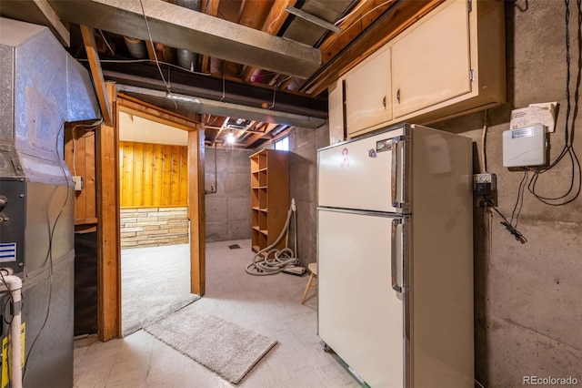 basement featuring white refrigerator