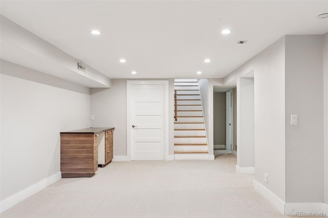 260 S Jasmine St, Denver, CO 80224 - finished below grade area featuring light carpet, baseboards, recessed lighting, and stairs