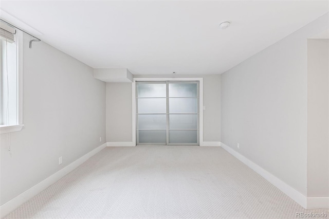 260 S Jasmine St, Denver, CO 80224 - unfurnished bedroom with light carpet and baseboards