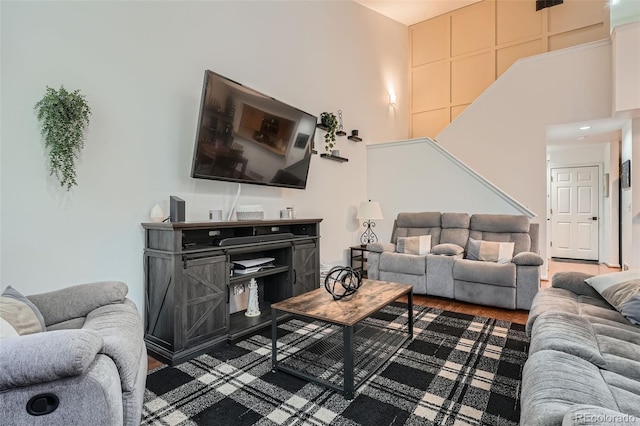 6839 Zenobia St Unit 3, Westminster, CO 80030 - living room with a towering ceiling and wood finished floors