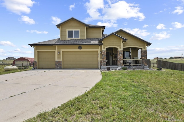 view of front of house with a porch and a front yard