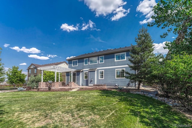 back of house featuring a patio, a lawn, and a pergola