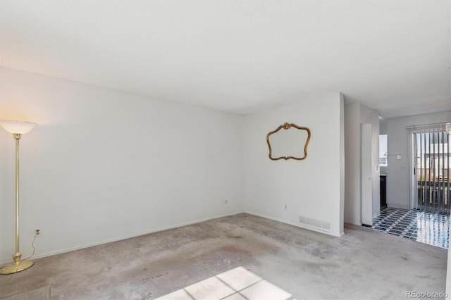 892 Summer Dr Unit 15B, Highlands Ranch, CO 80126 - carpeted spare room with baseboards