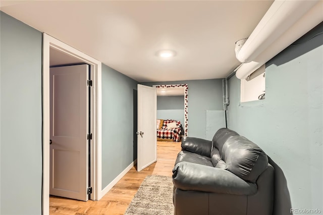 655 S Perry St, Denver, CO 80219 - sitting room featuring baseboards and light wood-type flooring