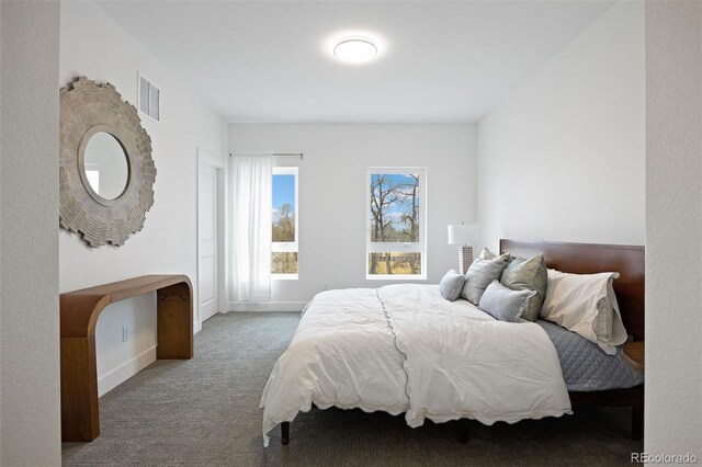 5189 Carr St, Arvada, CO 80002 - carpeted bedroom featuring baseboards