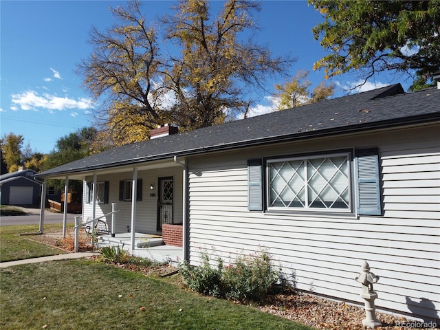 view of front of property with a front lawn and a porch