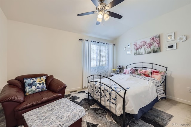 bedroom featuring lofted ceiling, a ceiling fan, baseboards, and carpet