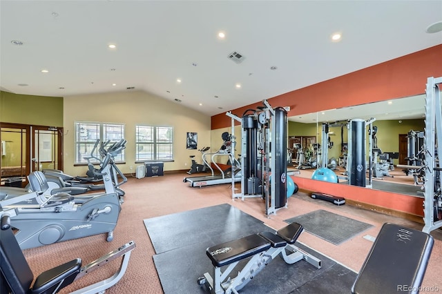 workout area with recessed lighting, vaulted ceiling, and visible vents