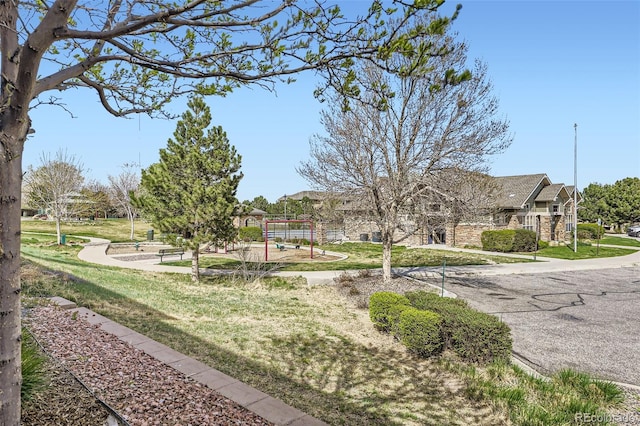 surrounding community featuring a lawn