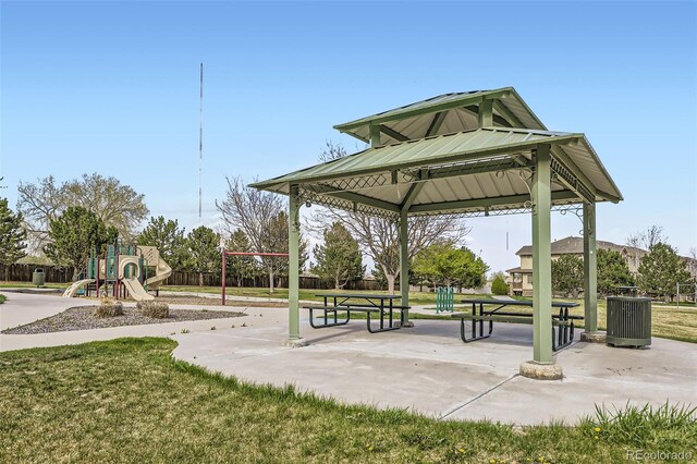 view of community featuring a gazebo, a yard, and playground community