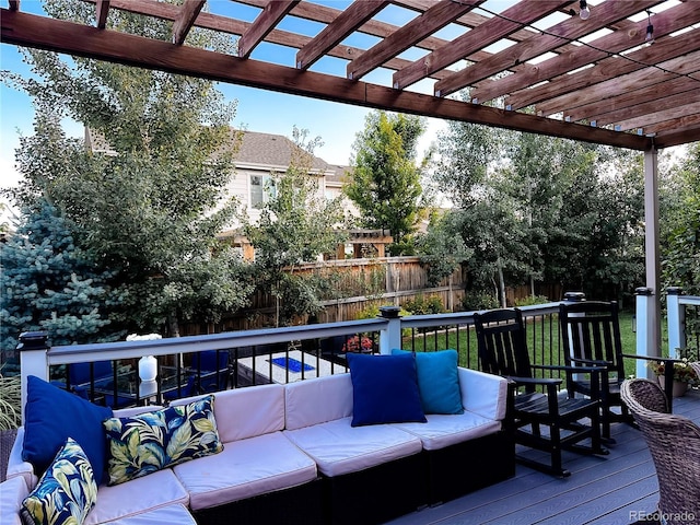 15468 W 50th Pl, Golden, CO 80403 - wooden deck with an outdoor hangout area and a pergola