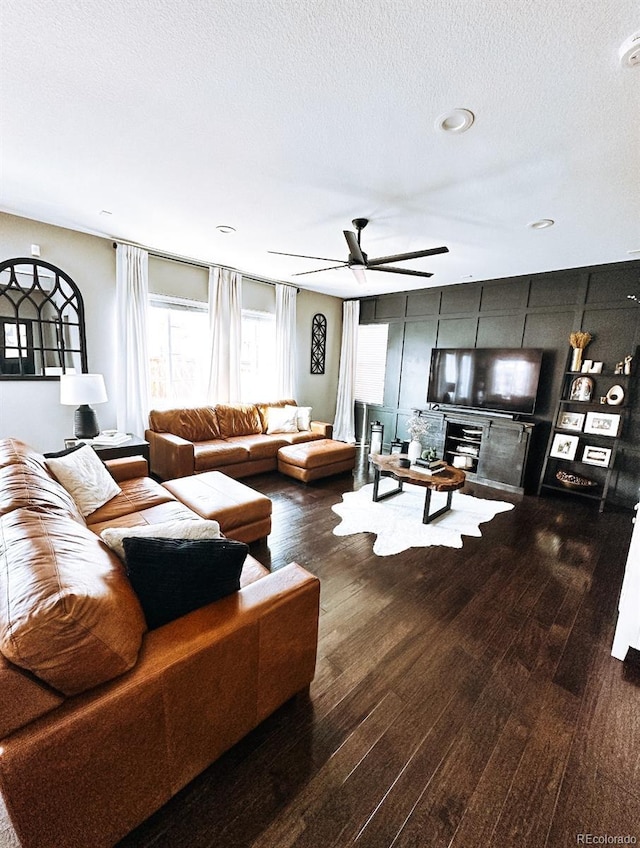 15468 W 50th Pl, Golden, CO 80403 - living room with a ceiling fan, wood finished floors, and a textured ceiling
