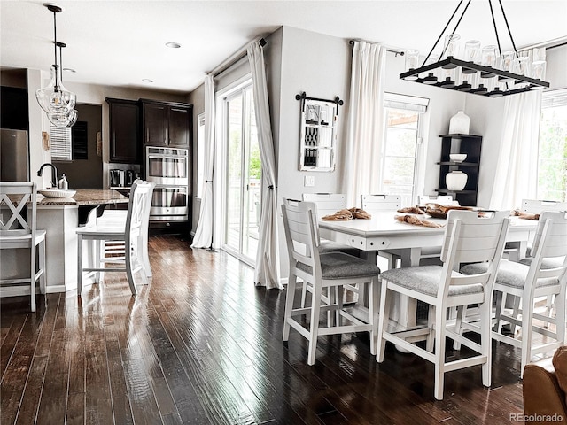 15468 W 50th Pl, Golden, CO 80403 - dining space featuring dark wood-type flooring, a chandelier, and recessed lighting
