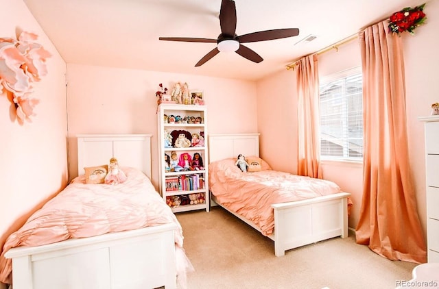15468 W 50th Pl, Golden, CO 80403 - carpeted bedroom with a ceiling fan