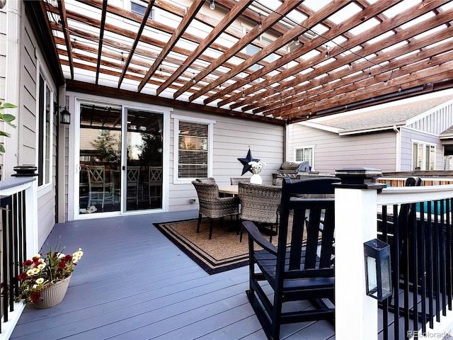 15468 W 50th Pl, Golden, CO 80403 - wooden deck featuring outdoor dining area, a pergola, and area for grilling