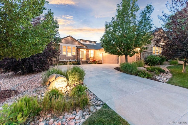 24906 E Geddes Cir, Aurora, CO 80016 - craftsman inspired home featuring driveway, stone siding, and an attached garage