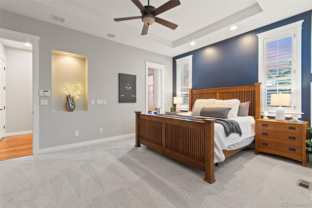 24906 E Geddes Cir, Aurora, CO 80016 - carpeted bedroom with recessed lighting, a tray ceiling, and ceiling fan
