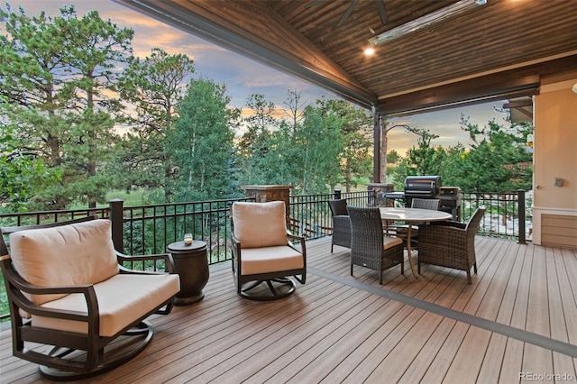 24906 E Geddes Cir, Aurora, CO 80016 - deck at dusk featuring outdoor dining space and grilling area