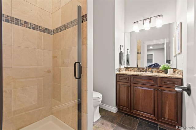 24906 E Geddes Cir, Aurora, CO 80016 - bathroom featuring vanity, a shower stall, and decorative backsplash