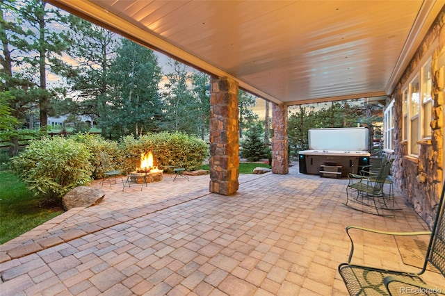 24906 E Geddes Cir, Aurora, CO 80016 - view of patio with a fire pit and a hot tub